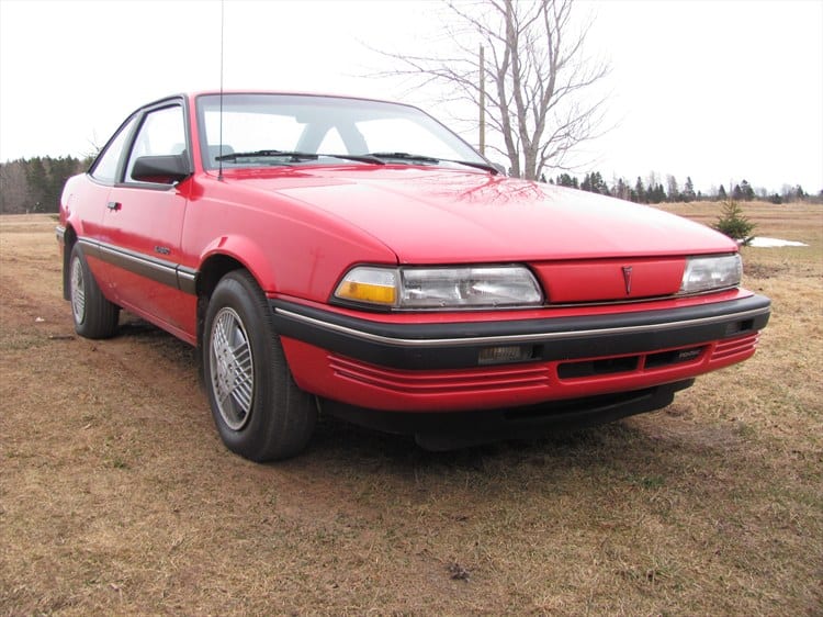 1991 Pontiac Sunbird red ugly car
