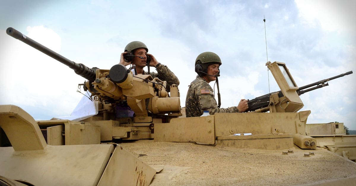 M1 Abrams- soldiers listen as other members of their crew call out information to them during the Tactical Combat Casualty Care event in the Gen