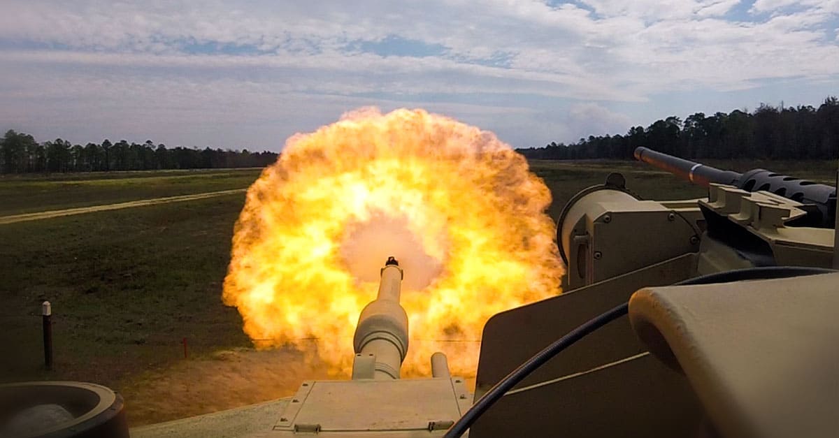 M1 Abrams- troopers fire the main gun round at a target during unit gunnery in M1A1-SA 
